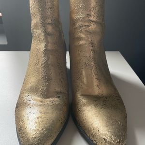 Dolce Vita gold metallic cowboy boots.